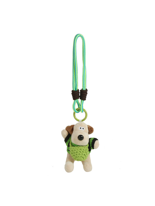 The HR Green Sweater Dog Plush Keychain features brown ears, a hand-knit green sweater, and a green-blue looped cord with two black beads. This adorable dog plush is the perfect bag accessory. Plain white background.
