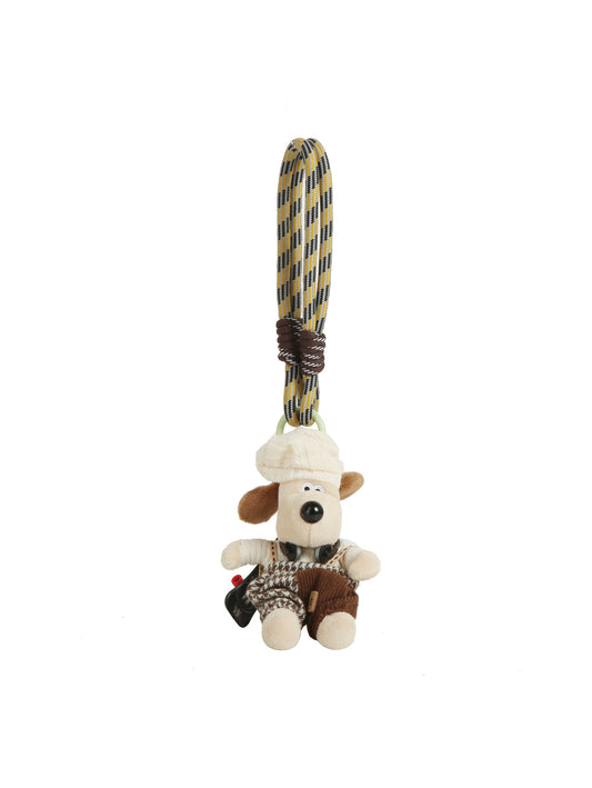 The HR Chef Dog Plush Keychain features a brown and beige chef dog with a camera, attached to a looped, multi-colored climbing rope—ideal as a fun backpack accessory.