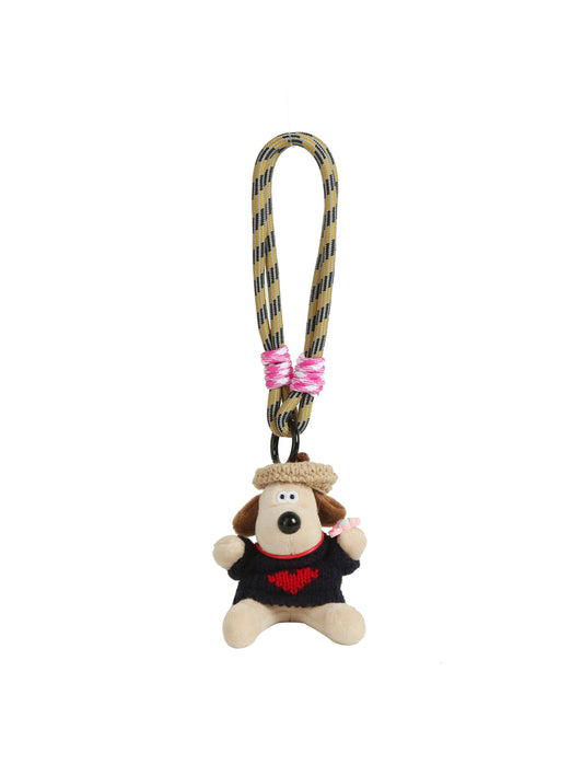 The HR Artist Dog Plush Keychain features a small dog in a heart sweater, attached to a yellow and black cord with pink and white accents—a charming gift for art lovers.