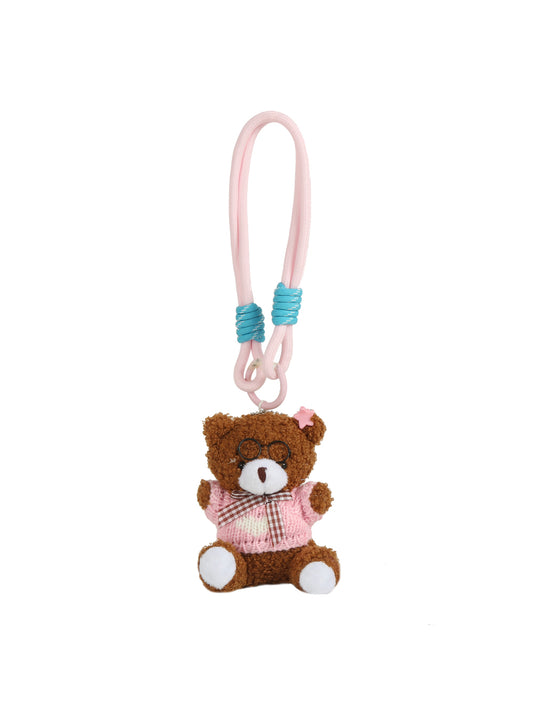 The HR Pink Sweater Bear Plush Keychain features a teddy bear in a pink knitted sweater and bow, hanging from a pink elastic loop with blue knots—an adorable accessory or gift for friends.