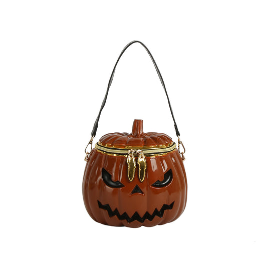 Pumpkin-shaped handbag with a black strap on a white background