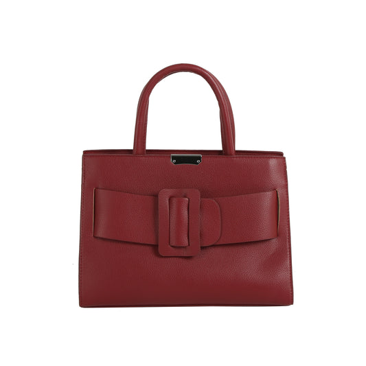 The LM Buckle Accented Structured Tote is a red leather bag with two handles, a large decorative bow, and a statement buckle detail on the front.