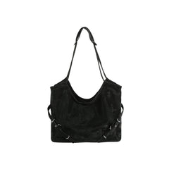 Black leather handbag with shoulder strap on a white background