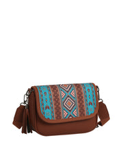 The HR Aztec Crossbody Set is a brown faux leather handbag with a flap showcasing a vibrant blue, pink, and brown geometric pattern, wide strap, tassel detail, and silver hardware.