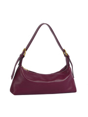 Purple handbag with gold accents on a white background
