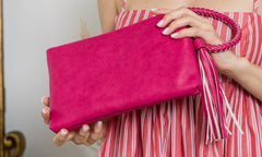 Braided ring handle wristlet clutch