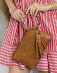 Braided ring handle wristlet clutch