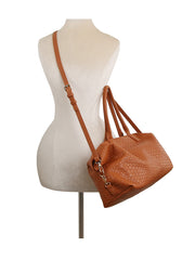 Textured leather duffle bag with crossbody strap