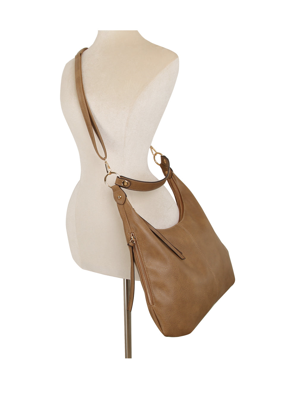 The LM 3 Piece Hobo Crossbody Wristlet features tan faux leather, gold hardware, a spacious main compartment, and an adjustable strap, shown on a cream dress form mannequin against a white background.