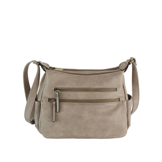 The LM Triple-Zip Organizer Crossbody is a taupe faux leather bag with an adjustable strap, two front gold-tone zip pockets, and a sleek, structured design.