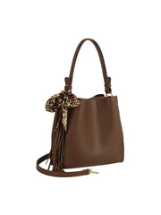 The HR Leopard Scarf Tassel Tote features brown faux leather, fringe details, long handles, a shoulder strap, and a leopard print scarf accent. It has a roomy interior and is displayed on a white background.