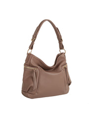The HR Soft Slouch Zip Shoulder Bag features taupe faux leather, a slouch design, single shoulder strap, two front zippered pockets with tassel pulls, and gold-tone hardware, displayed on a white background.
