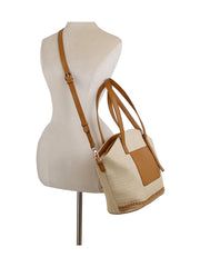 Straw vacation bag with front leather pocket