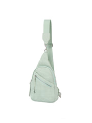 Diagnal zip front pocket sling backpack